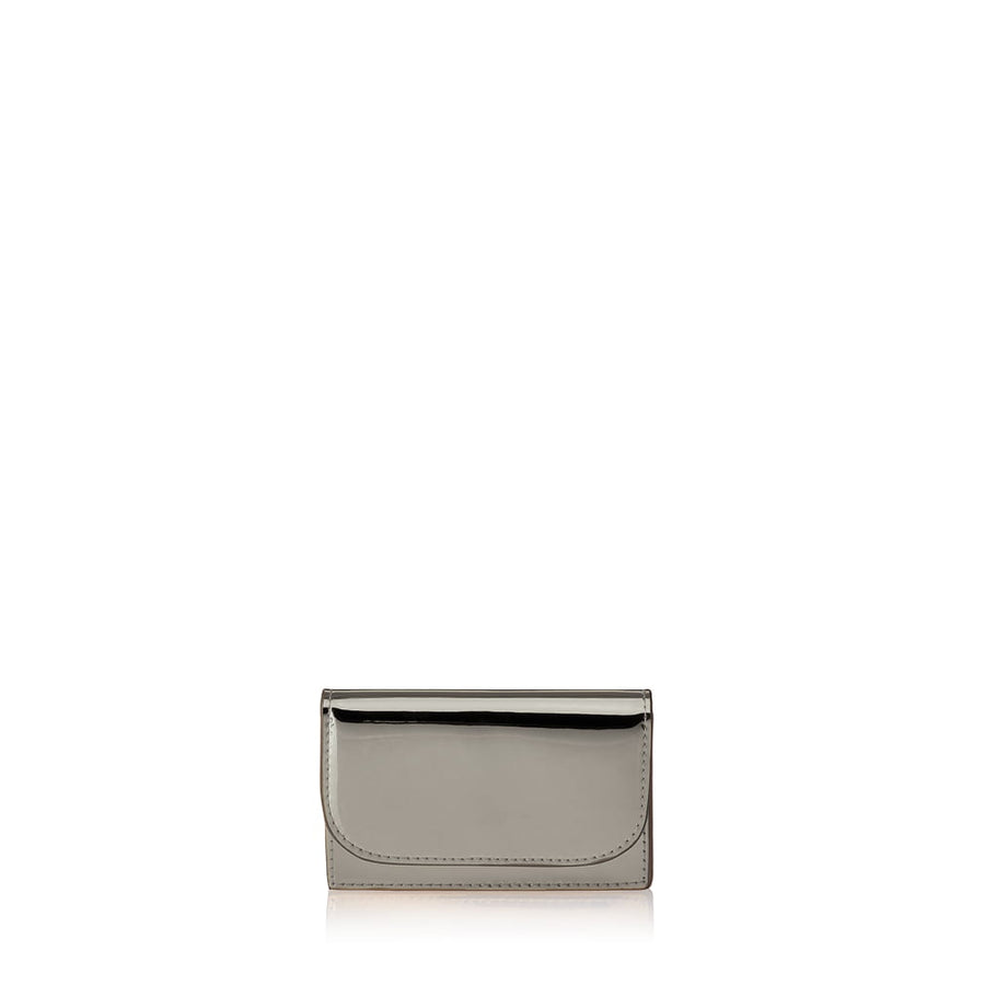 Julian Petit Warm silver metallic card case with Iris Maree logo on the inside pocket and golden press button