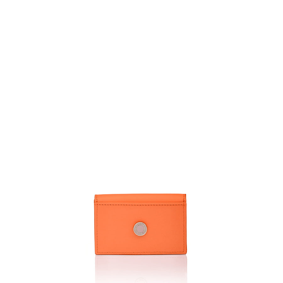 Julian Petit Parrot Orange card case with Iris Maree logo on the inside pocket and golden press button