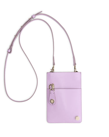 Back side of Floral Purple Merry Pouch phone case bag with adjustable cross-body strap with gold accessories attaching strap to bag. Extra pocket on the back side of the pouch with removable key chain with gold accessories and pink and gold Iris maree logo. On the right bottom of the bag there is a pink and white Iris Maree logo. The pouch is made from environmentally conscious material Kayla Fabric