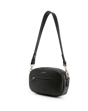 Poppy in Midnight Black with removable black strap with gold clips and gold accessories with front zipper compartment with gold zipper and gold Iris Maree logo on the front of the bag made from environmentally conscious material Kayla Fabric