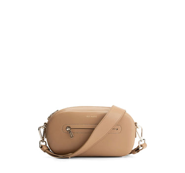 Poppy in Sandy Brown with removable sandy brown strap with gold clips and gold accessories with front zipper compartment with gold zipper and gold Iris Maree logo on the front of the bag made from environmentally conscious material Kayla Fabric
