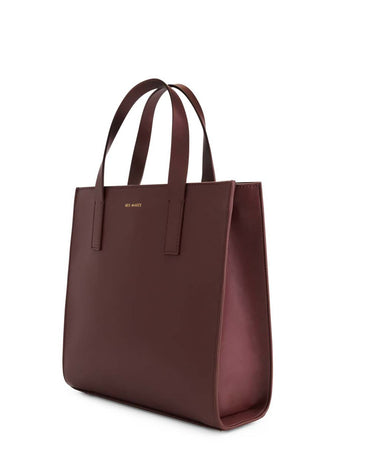 Jude Mini Tote Bag in Lily Maroon Burgundy with top-handle and a gold Iris Maree logo on the front of the bag made from environmentally conscious material Kayla Fabric
