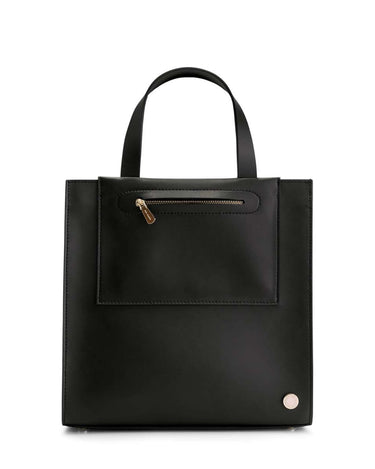  Jude Mini Tote in Midnight Black with top-handle the back of the bag has a pink and white Iris Maree logo on the bottom of the bag and on the top area of the bag there is one gold zip pocket with a gold zipper made from environmentally conscious material Kayla Fabric